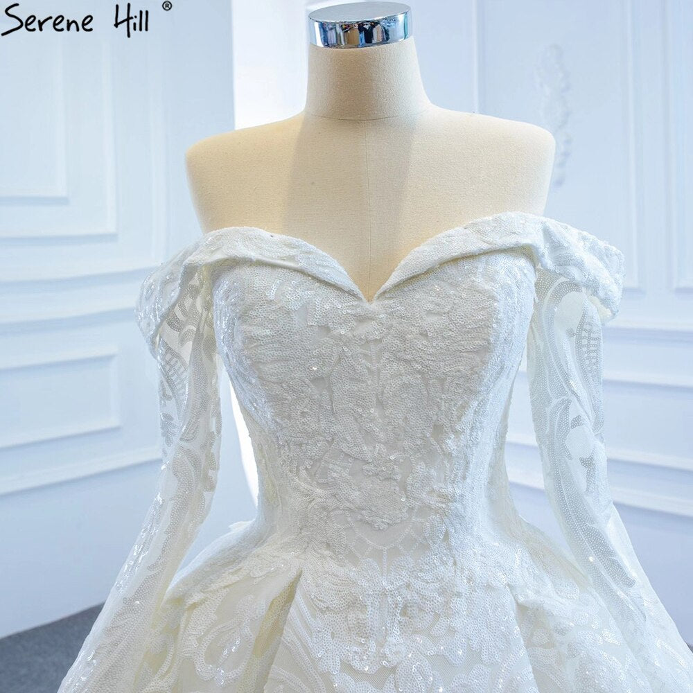 Serene Hill White Off Shoulder Sparkle Wedding Dresses Gowns Luxury Long Sleeves Lace Up Bridal Dress 2025 HM67222 - SERENE HILL